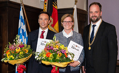 OB Eschenbacher honors Youssef Belkhadir (left) and Corinna Dawid Photo-City of Freising.jpeg
